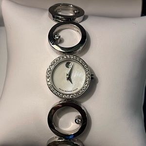 New Movado diamond bracelet style watch. Beautifully elegant.